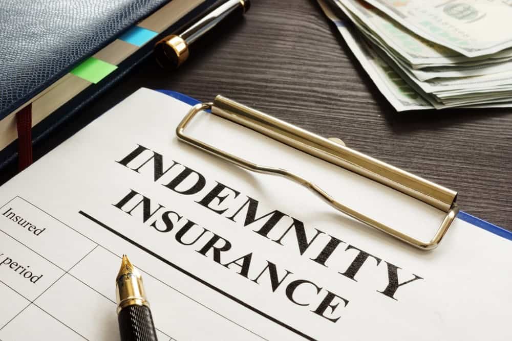 Indemnity insurance form on clipboard